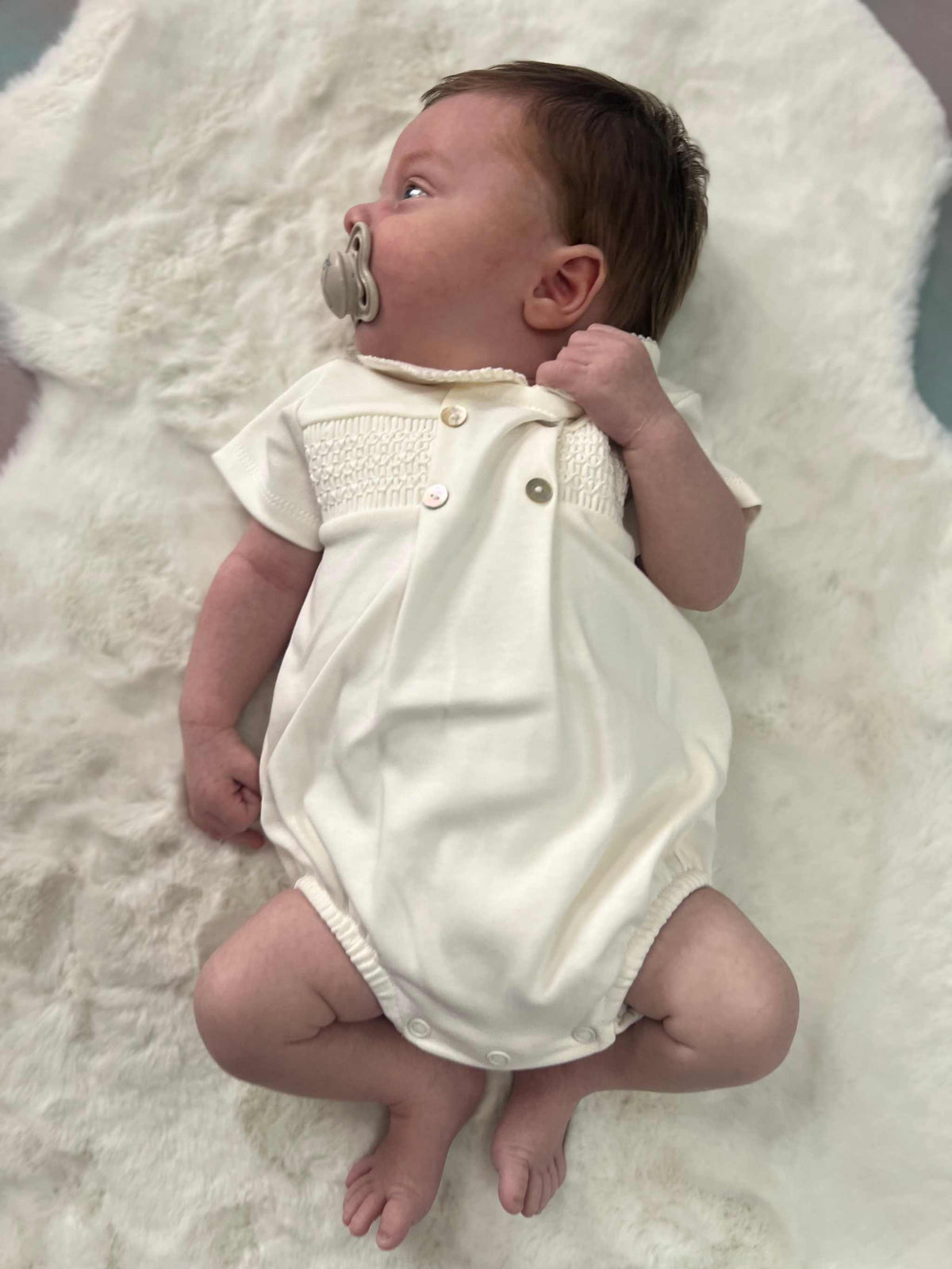 Unisex ivory smocked romper